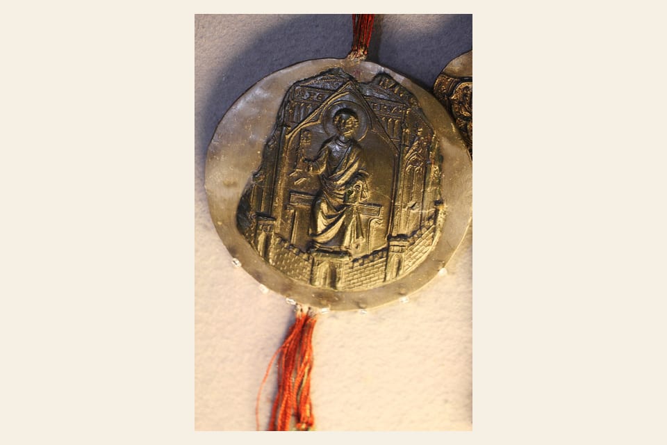 Gold seal of Cologne on a medieval civic document
